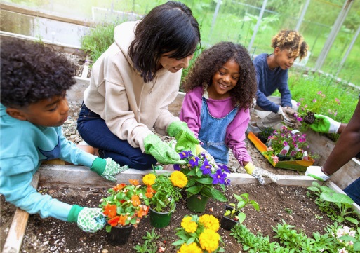 Family Participating in a School Gardening Day