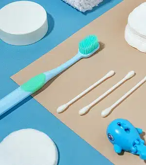 An array of hygiene items including toothbrush
